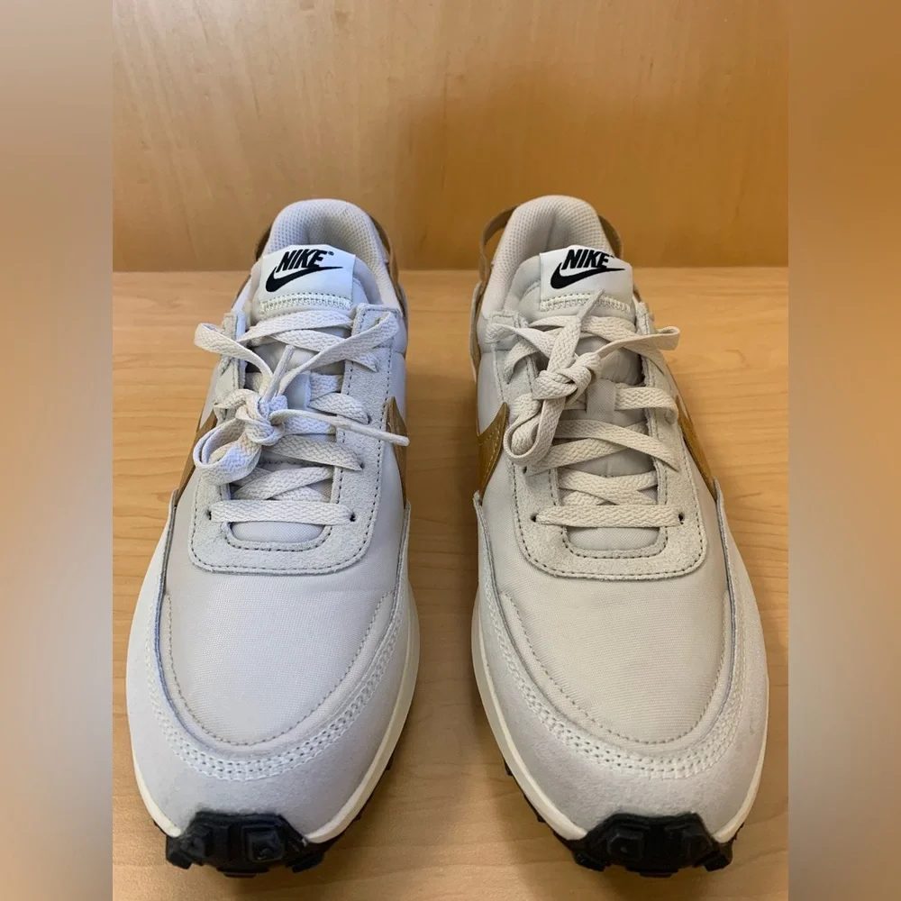 Nike Women's Light Gray Sneakers with Mustard Swoosh